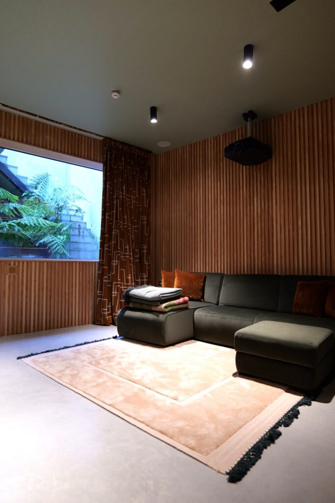 Basement cinema room with slatted timber walls, 31 Edna Street