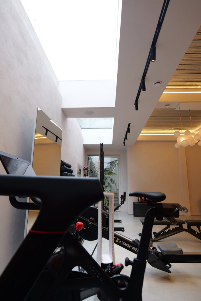 Basement home gym beneath a lightwell, 31 Edna Street