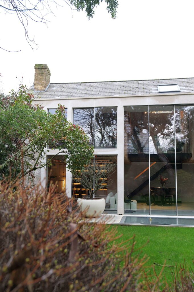 Double-height rear glazing at 31 Edna Street, Battersea