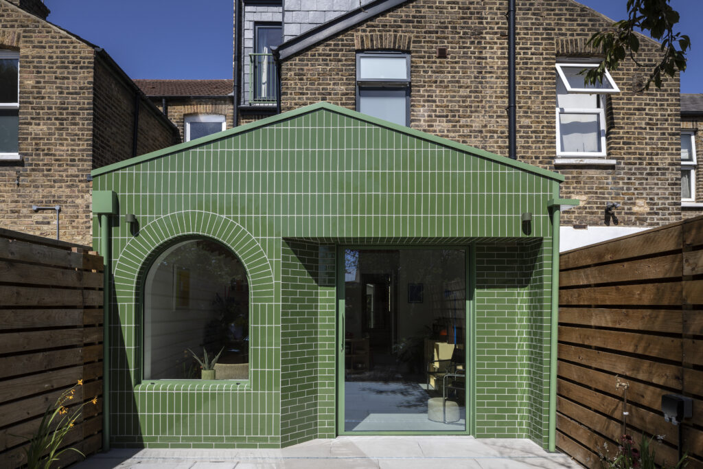 Green tiled rear house extension in Brockley, SE4