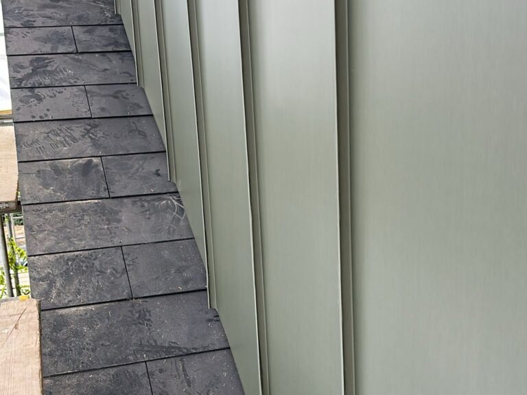 Standing seam aluminium dormer cheek cladding with slate roof by Excel Construction in Honor Oak, South London