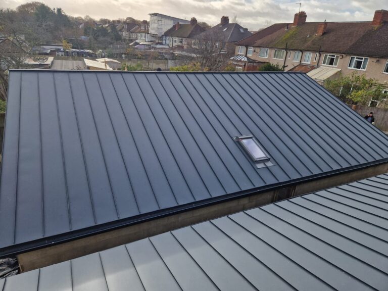 Standing seam aluminium roof with rooflight by Excel Construction in Morden, South London